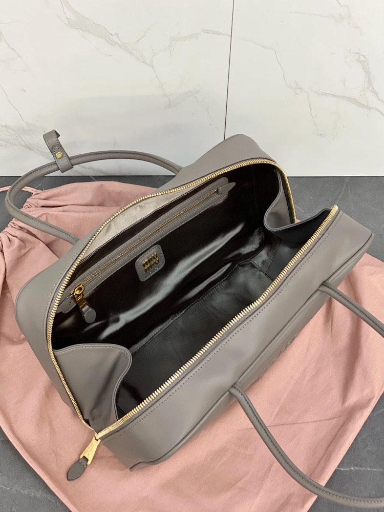 miumiu Original Leather Handheld Official Document Bag for Women 2025 New Large Capacity Retro Under